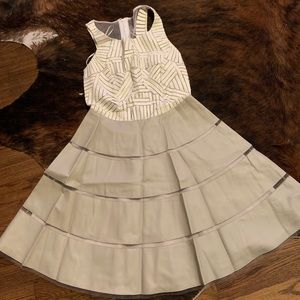 Leather and net cocktail dress